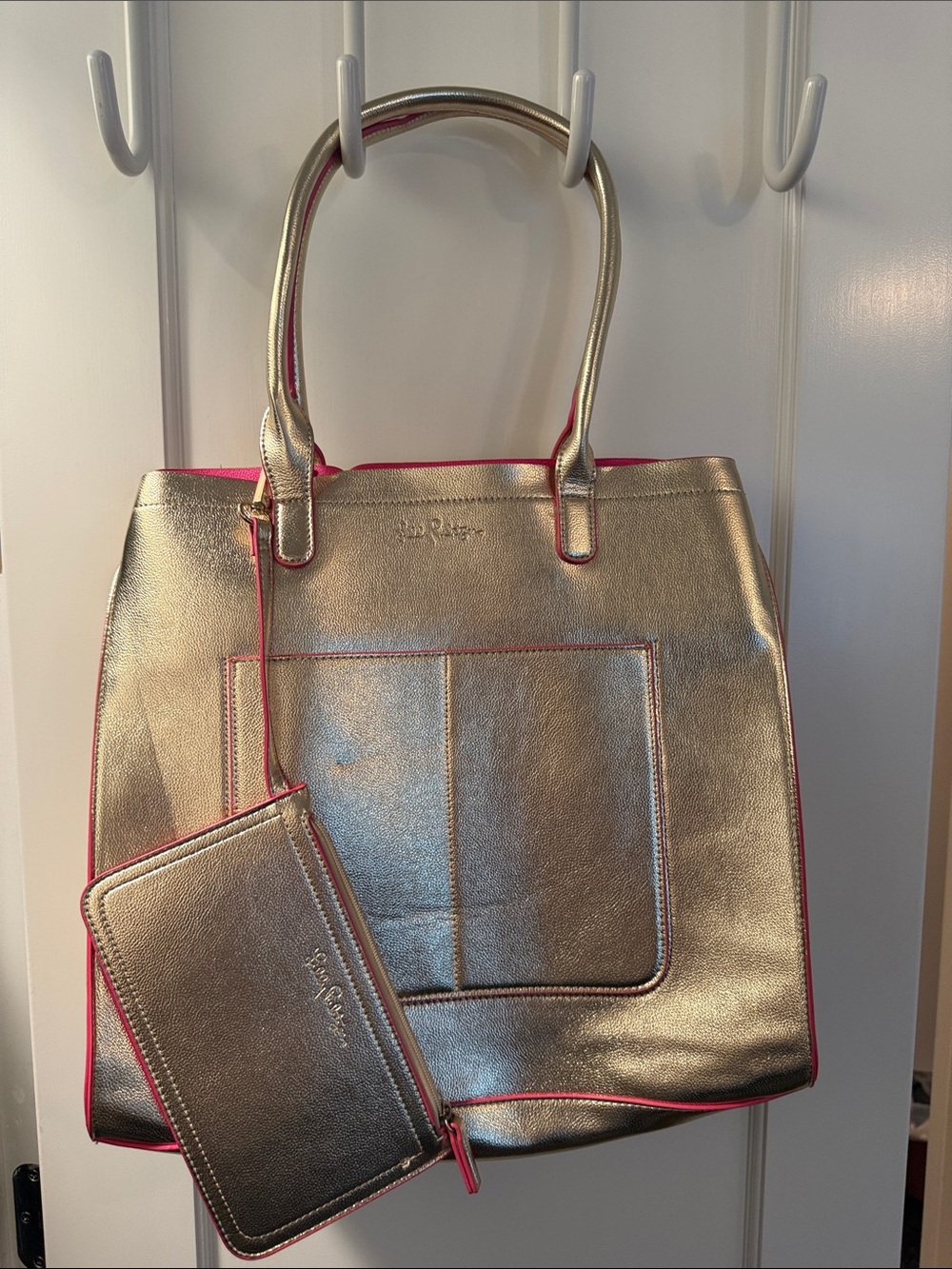 NWOT Lilly Pulitzer Metallic Gold Tote with Pink Trim and Wristlet. Never used